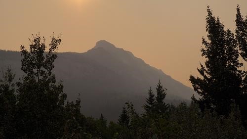 Cinquefoil Mountain under a hazy morning sun.