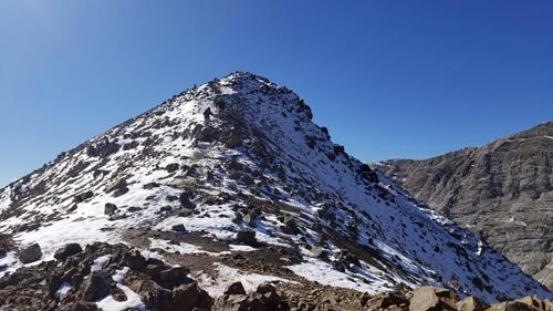 Descending the high point. Compacted snow made icey spots on the trail.
