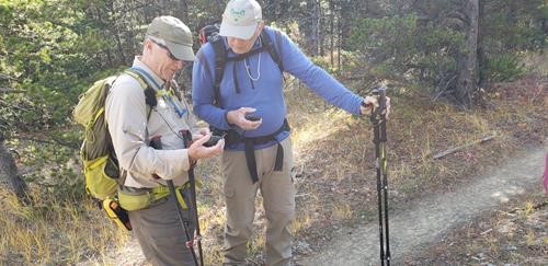Gary and Joe--boys with GPS toys find the way to the knob