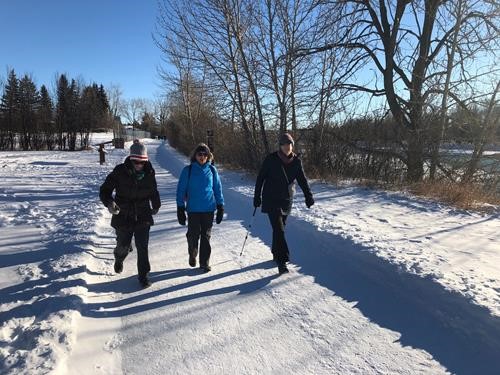 Dee, Barb and Brieta walking along Baker Park
