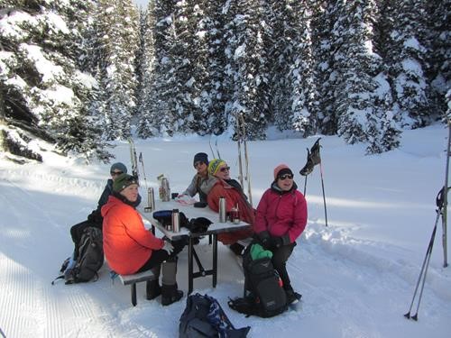 group of reprobates hogging the picnic table (ringleader in yellow tuque)