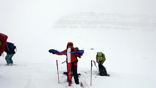 Stripping skins above Helen Lake