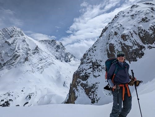 Ulli at the col French glacier behind her 