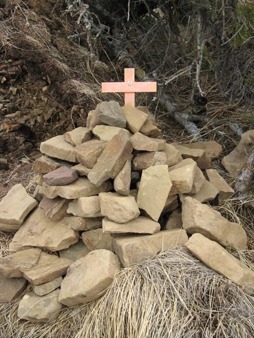 Who or What is under this pile of rocks ??