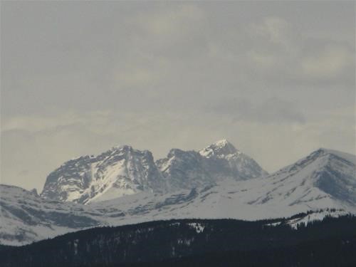Views from the top: A distant Mt. Rae