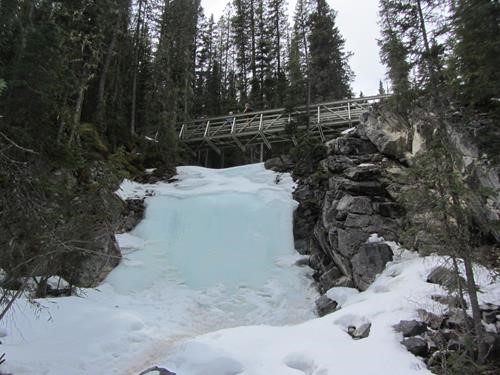 The still solidly frozen waterfall along the trail from Jewell Pass