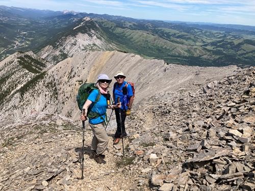 Carl and Jane with ascent ridge in background 