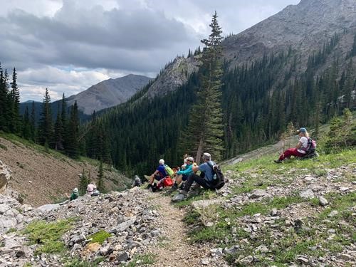 Relaxing before descending the rubbly creek bed