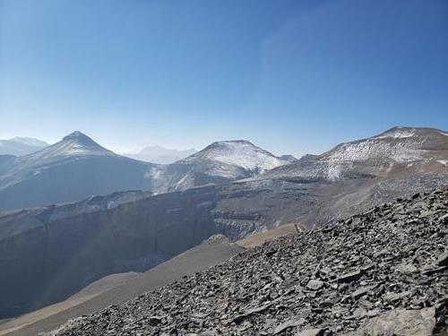 From right to left is Mount Cornwall, Outlaw, and Banded Peak as seen from Mount Glasgow