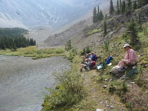 Lunch beside the 4th Picklejar Lake, note snow dusting on distant slope