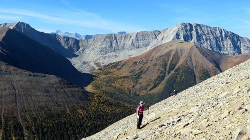Sonya with Pocaterra Ridge and Tyrwhitt in the background