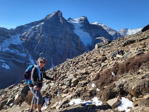 Janice heading up the trail above Saddle Pass