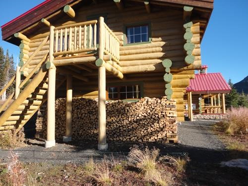 Assiniboine Lodge with wood pile