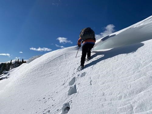 Climbing over the cornice