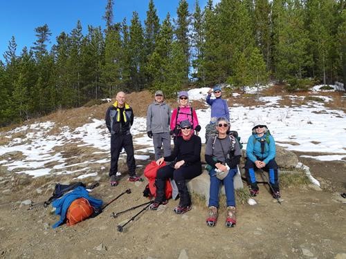 Enjoying the sun at the Merlin rock bench