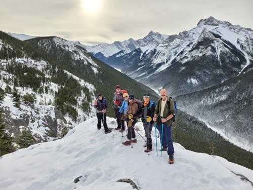 A brief pause on the snowy trail