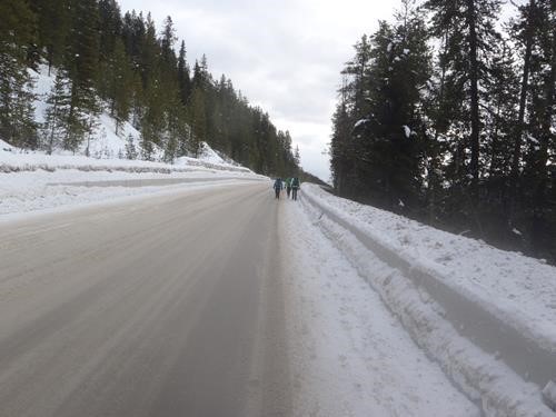 Walking up Hwy 1A to retrieve the skis