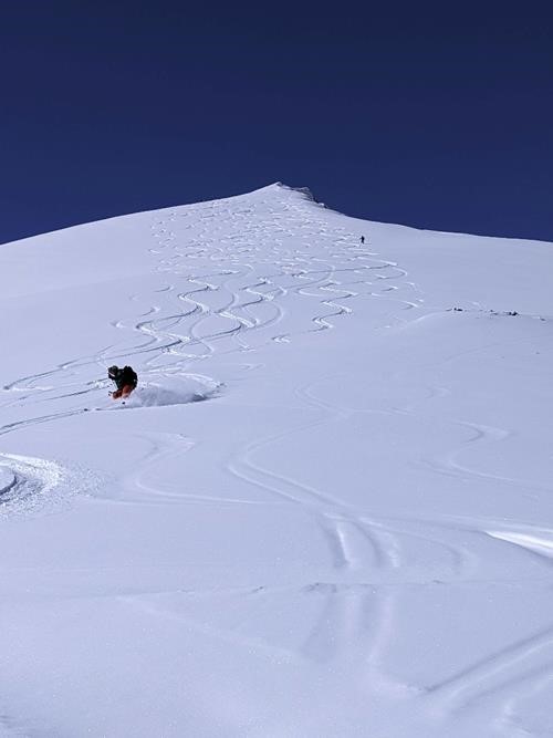 Skiing down the outlier of Hilda Peak 