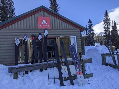 Parked skis outside Hilda Hostel