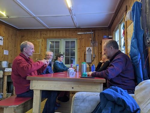 Ramblers play cards at Hilda Hostel