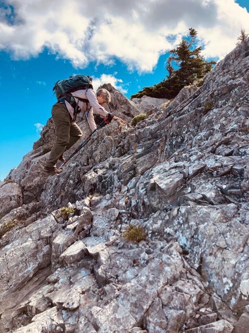 Barb enjoying a bit of hands-on-rock