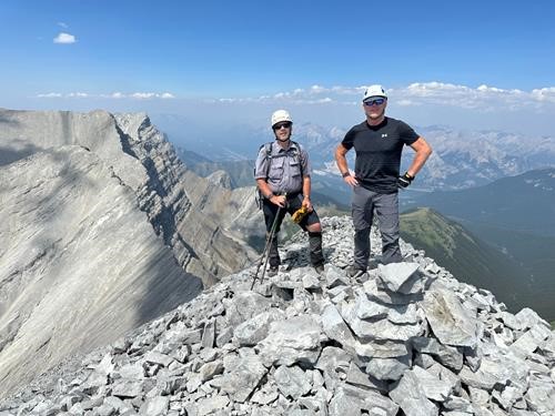 {1288 Brian Pinter} and {2007 si gar} at the summit of Lougheed 4 (Wind Mountain) in line with 3 other Lougheed Peaks. (photo courtesy {2007 si gar})