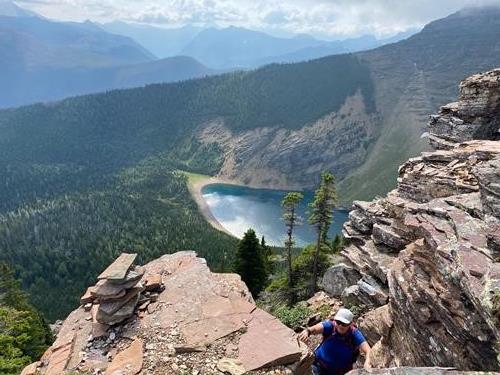 Scrambling up with Forum Lake below