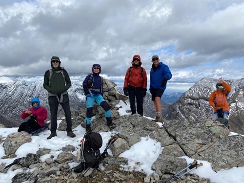 N Kent summit, with one person brave (or foolish) enough to still be wearing shorts