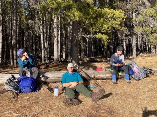 Enjoying the unexpectedly warm and calm meadow for lunch