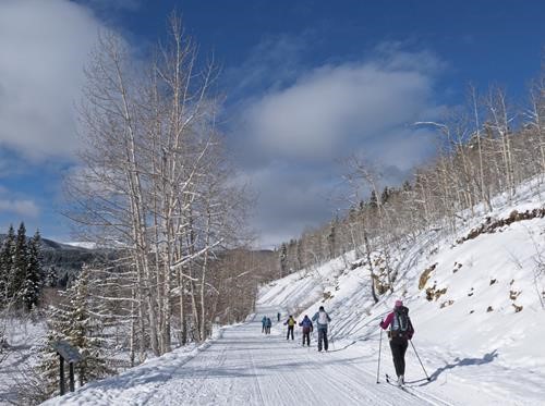 Starting out in sun on the recently groomed and trackset Mountain Road.