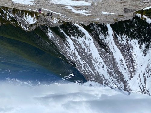 Atmospheric skies which only the photographer may have noticed, as the rest of us had our heads down marching up the scree.