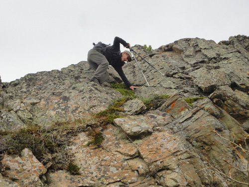 {1456 cl p} downclimbs small cliff on west end (hp3) of Lusk Ridge East. There was an easier route but it went through deep snow. 