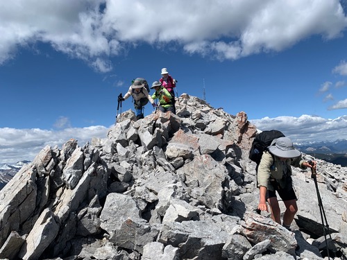 A bit of scrambling to avoid steep snow slopes