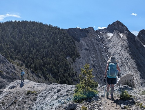 The first section of the ridge, our lunch spot (the small bump) and larger pointed pinnacle to the west of it in the distance