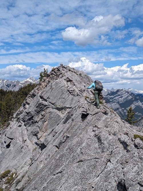 Sim returning to our final summit point 