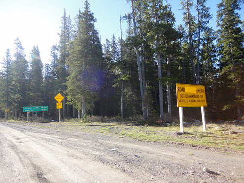 Road signs at intersection of roads 532 and 940 near Plateau Mtn. trailhead