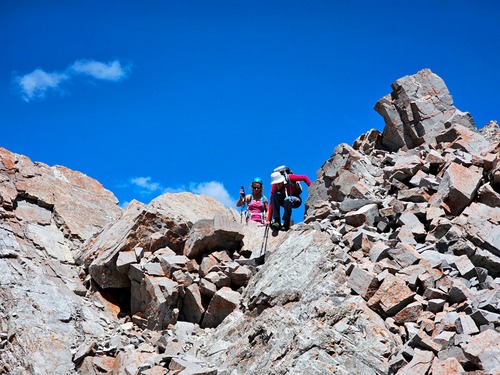 Nardi, assessing the downclimb from the first summit