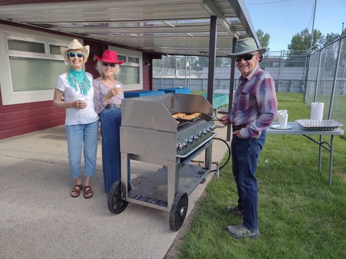 the set-up crew and one of the cooks