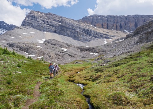 Heading out along the burbling brook in the beautiful green hanging valley.