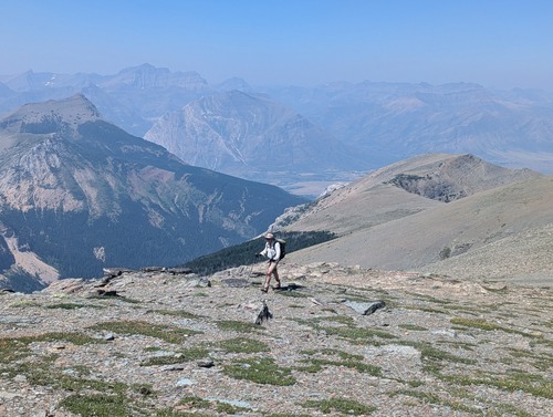 John nearing the top of the ridge, the ascent ridge in the background