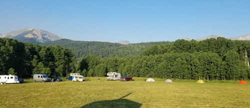 The Belly River group campsite looking northwest. The treed perimeter provided a good windbreak and shade in the late afternoon.