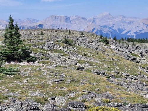 A majestic backdrop as the group traverses the final ridge