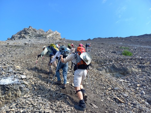 The steep climb to the col