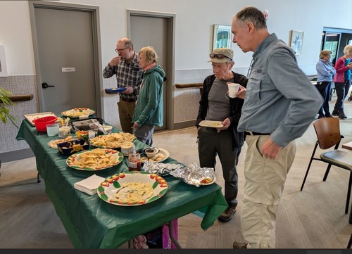 Scoping out the appetizers table: {1885 Gord Gil}, {172 Chris Gro}, {1456 cli pott}, {140 Norm Acq}
