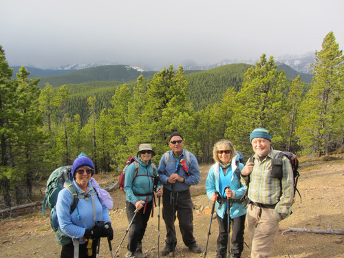 Group photo part way up- note the threatening clouds hiding the peaks to the west