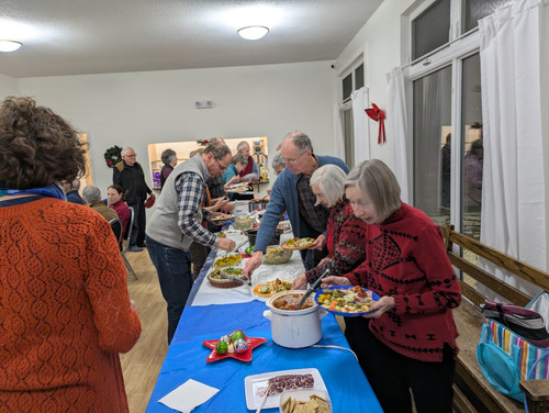 Chow line at the Christmas potluck