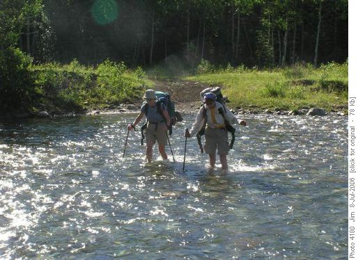 Ginger and Margaret fording the knee deep waters of the Highwood River Ginger and Margaret fording the knee deep waters of the Highwood River