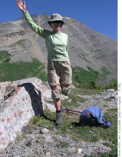 Ginger demonstrates a yoga stretch with Mount McPhail in the background Ginger demonstrates a yoga stretch with Mount McPhail in the background