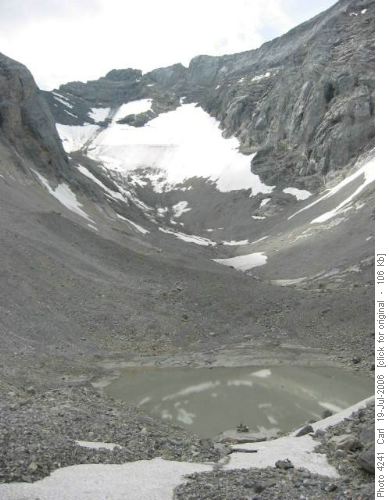 Tiny tarn at the foot of Rae Glacier