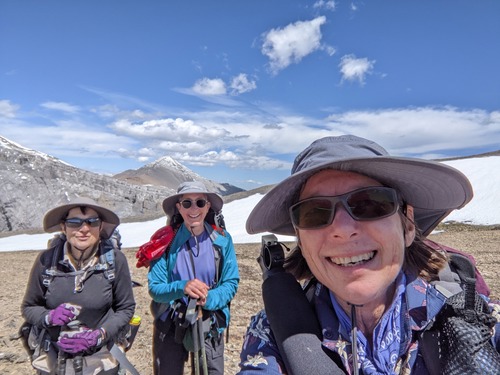 Backpackers with matching hats